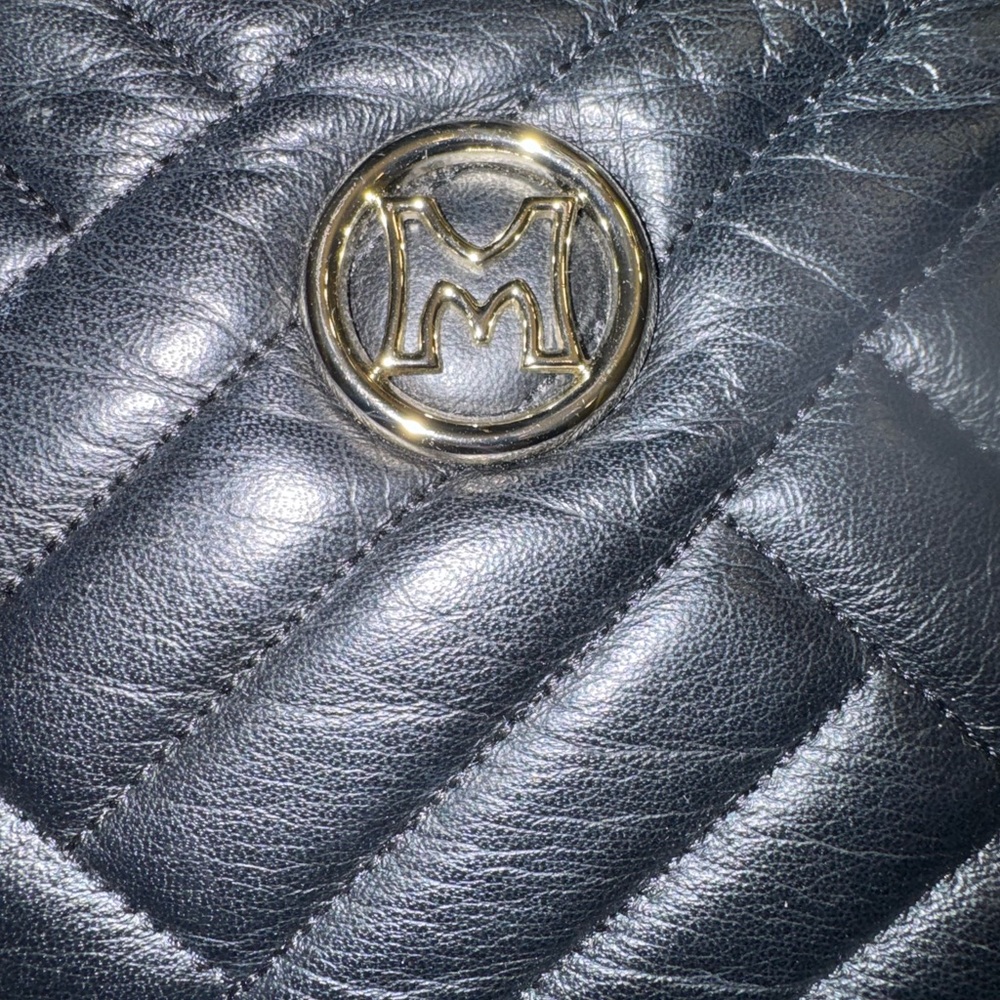 Metrocity Black Crossbody Bag with Gold Accents - Picture 2 of 7